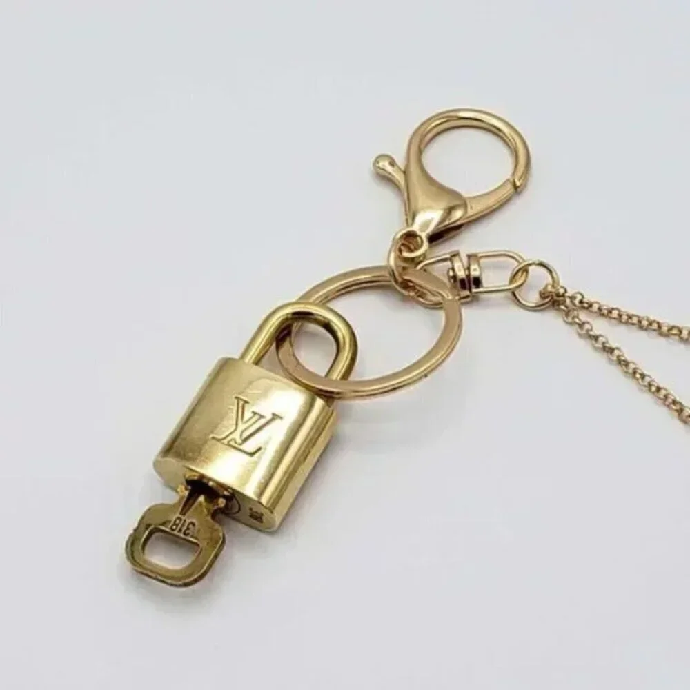 Authentic Louis Vuitton Lock & Key Gold ✨ Unbranded Keychain Bag Charm LV